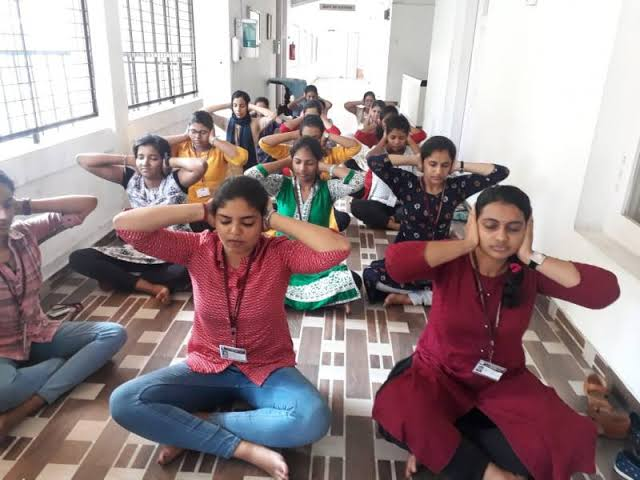 Traditional yoga practice and meditation at Bihar Yoga Siksha Sansthan
